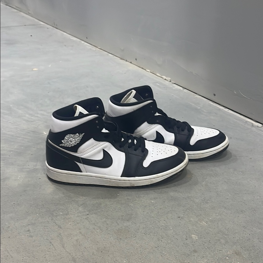 Nike Black and White High-Top Sneakers with Retro Design